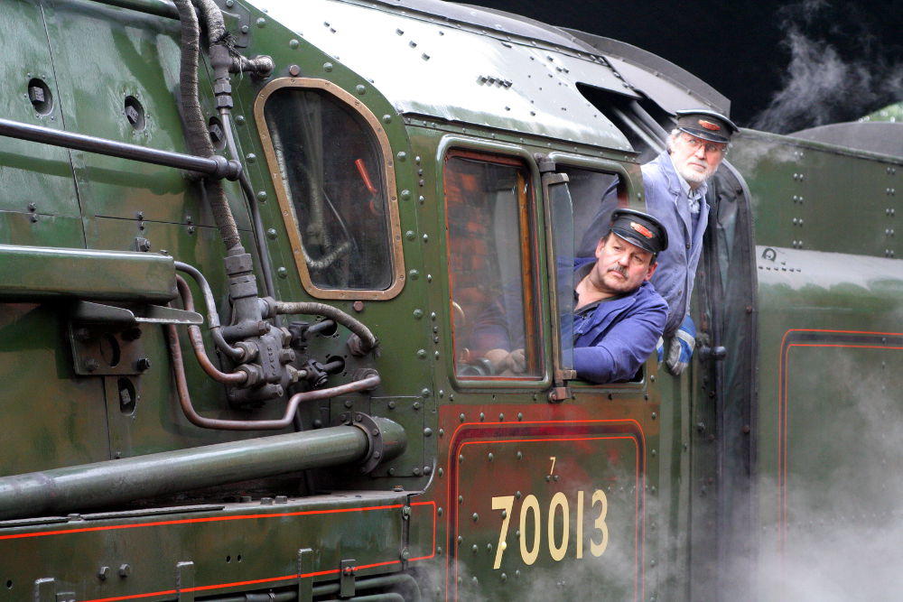 Steam railwaymen aboard'Oliver Cromwell' at Great Central Railway, Leicestershire